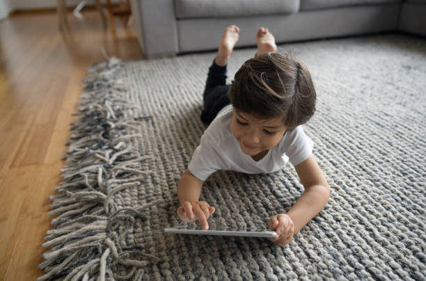 Girl lying on carpet floor | Magic Carpets